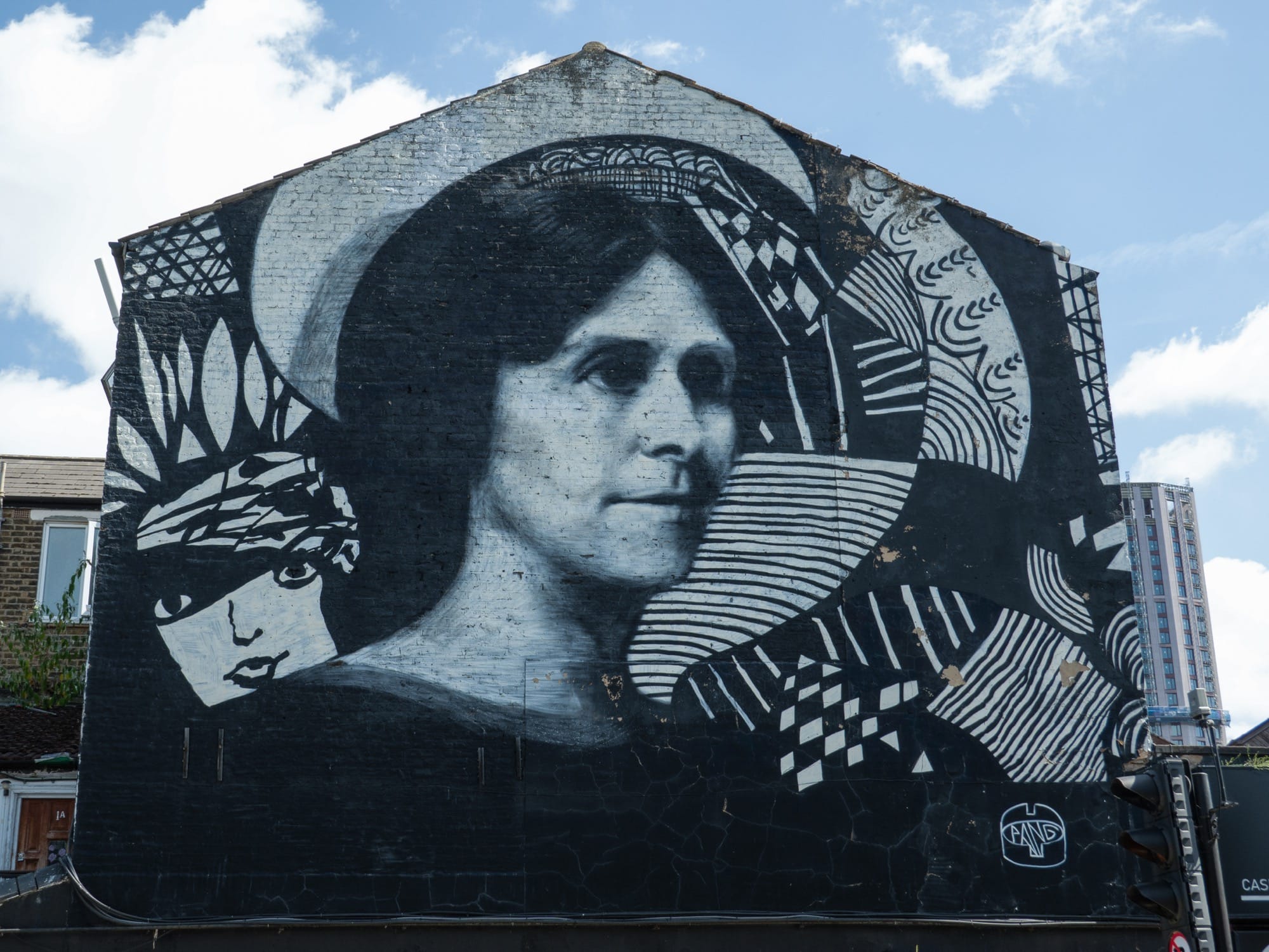 a black-and-white mural by PANG of Madge Gill
