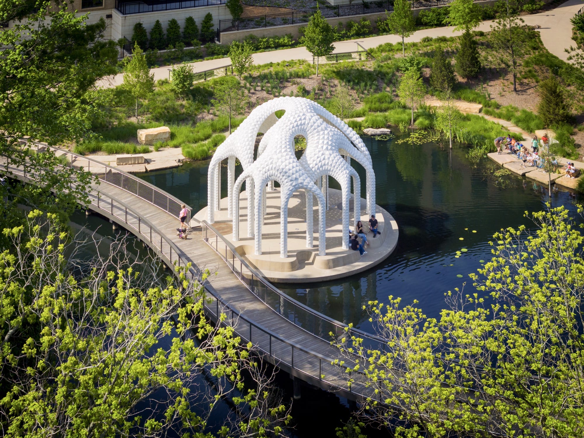 A contemporary pavilion made from thousands of geometric white facets