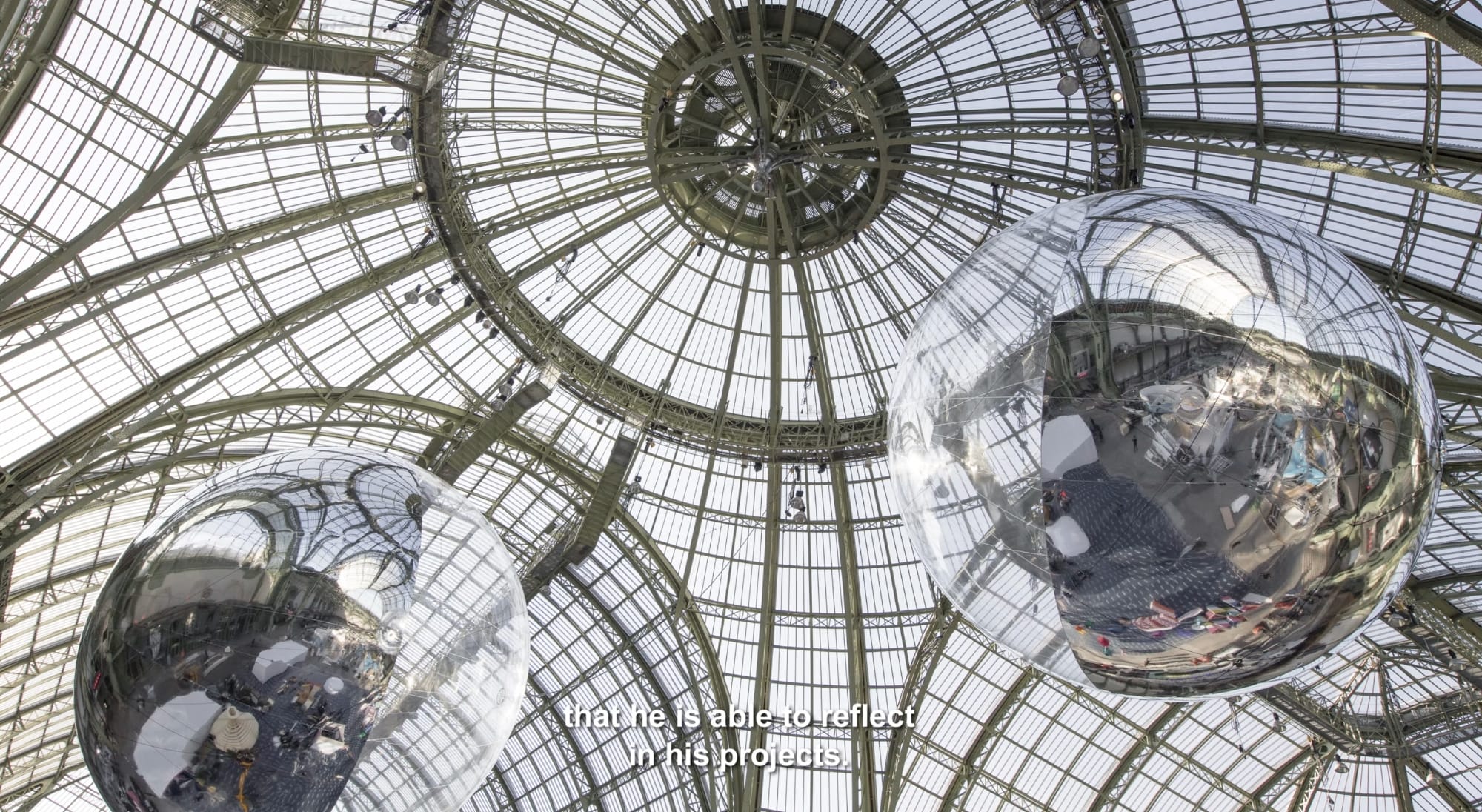 orbs float in the air in an installation by tomas saraceno