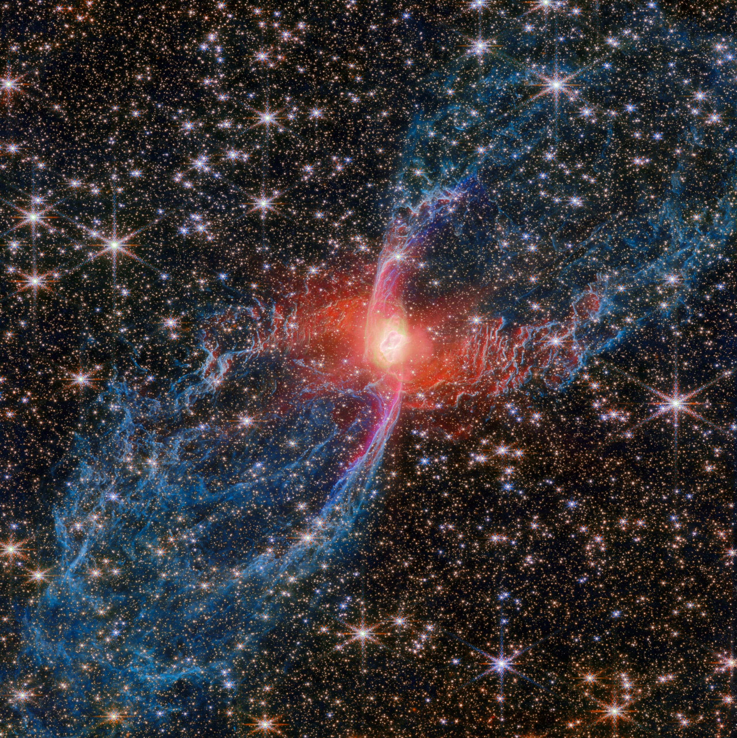 a photograph taken by the Webb space telescope of a planetary nebula called the Red Spider Nebula